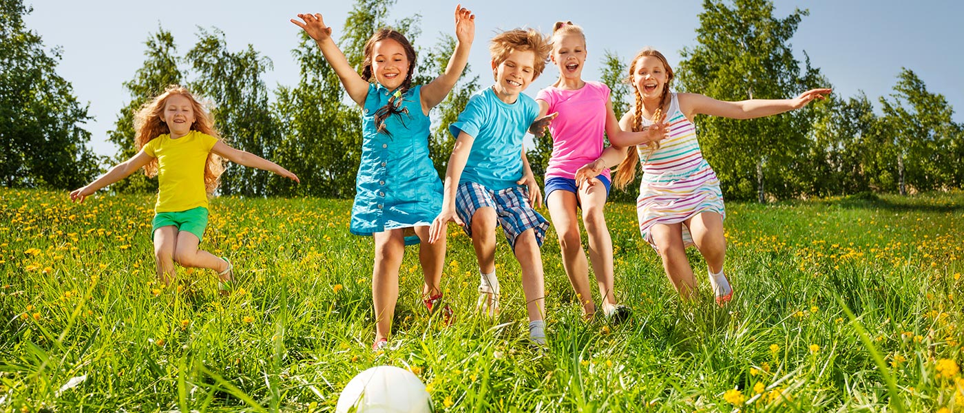 Kids Playing in a field