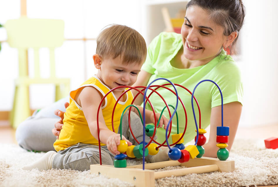 Young Child having Great fun with Nanny